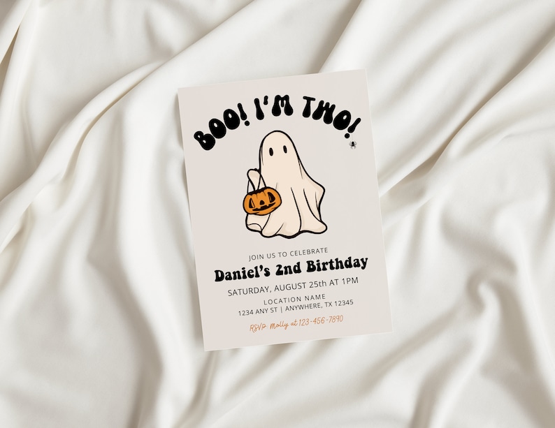 May include: A Halloween-themed birthday invitation with a cartoon ghost holding a jack-o'-lantern. The invitation reads "BOO! I'M THO!" and includes details for Daniel's 2nd birthday party.