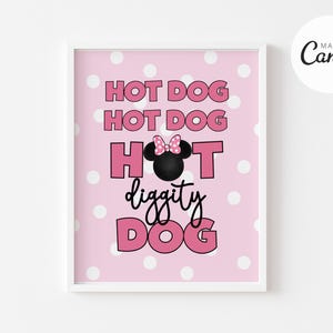 May include: Pink printable sign with white polka dots and the text "Hot Dog Hot Dog Hot Diggity Dog" in black and pink lettering. A black and white cartoon mouse head with a pink bow is in the center of the sign.