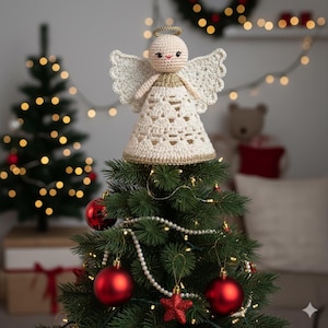 May include: A cream and gold crochet angel tree topper with a halo and wings. The angel is placed on a decorated Christmas tree with red baubles and fairy lights. The background features a Christmas tree and festive lights, creating a holiday atmosphere.