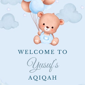 May include: A light blue baby shower announcement with a brown teddy bear holding blue and brown balloons. The text reads "Welcome to Yusuf's Aqiqah 06.10.23".