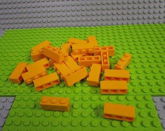 25CT Lego Bright Light Orange Brick 1 x 3