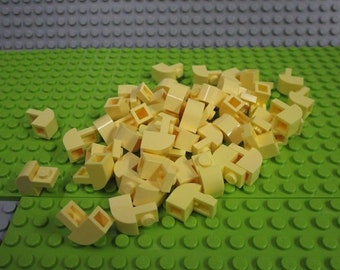 50ct Lego Bright Light Yellow Slope, Curved 2 x 1 x 1 1/3 with Recessed Stud