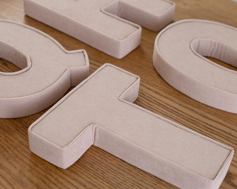 May include: A handmade wooden sign with the text "Welcome" in a playful font. The sign features a distressed white background and a dark brown frame, perfect for a front door or entryway. The sign measures approximately 12 inches wide and 6 inches tall.