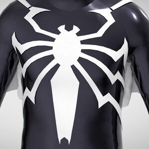 May include: A black and white superhero costume with a spider web design on the chest.