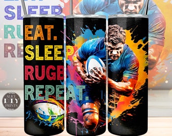 May include: A black tumbler with a colorful design featuring a rugby player and the text "Eat. Sleep. Rugby. Repeat."