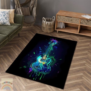 May include: A black and blue electric guitar with colorful paint splatters on a black background. The guitar is a popular style of electric guitar with a double cutaway body.
