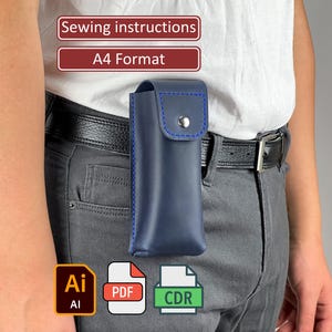 May include: A navy blue leather case with blue stitching and a silver snap closure is attached to a person's belt. The text "Sewing instructions" and "A4 Format" are displayed above the case. Icons for AI, PDF, and CDR files are also visible.
