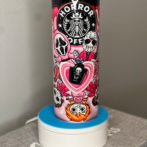 Gezwollen roze horror tuimelaar