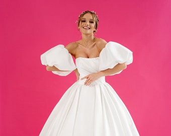 Majestueuse robe de mariée princesse bustier plisser avec de magnifique manches ballon amovibles en satin