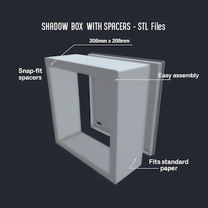 以下が含まれることがあります： スナップフィットスペーサーを備えた白いシャドウボックス。組み立てが簡単です。ボックスのサイズは20.8cm x 20.8cmで、標準的な用紙に適合します。画像には「SHADOW BOX WITH SPACERS - STL Files」と書かれています。