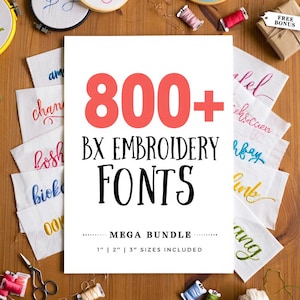 May include: A white sheet of paper with the text "800+ BX EMBROIDERY FONTS MEGA BUNDLE" in black and red. The image includes samples of embroidered fonts in various colours, embroidery hoops, and spools of thread.