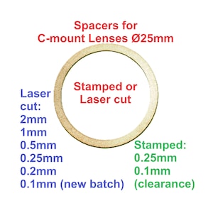May include: A circular spacer for C-mount lenses, with a diameter of 25mm. The image shows laser-cut and stamped options, with thicknesses ranging from 0.1mm to 2mm. Text on the image indicates "Spacers for C-mount Lenses".
