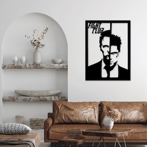 Puede incluir: Arte de pared de metal en blanco y negro con la silueta de dos caras de hombres con el texto "Fight Club" encima.
