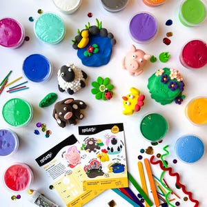 May include: A set of colourful play dough with farm animal and nature themed play dough shapes. The set includes instructions for making different farm animals and scenes. The set also includes tools for shaping the play dough, such as sticks and a rolling pin.