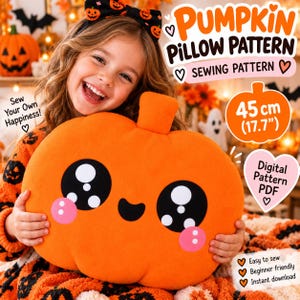 May include: A digital sewing pattern for a 45 cm (17.7 inch) pumpkin pillow. The pattern features a bright orange pumpkin with a smiling face, large black eyes with white highlights, and pink cheeks. Text includes Pumpkin Pillow Pattern, Sewing Pattern, and Digital Pattern PDF.