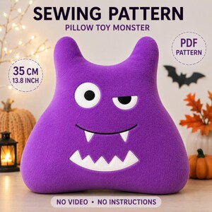 May include: A purple plush pillow toy monster sewing pattern featuring the text SEWING PATTERN PILLOW TOY MONSTER, 35 CM 13.8 INCH, PDF PATTERN, and NO VIDEO NO INSTRUCTIONS. The monster has two horns, one round eye, one squinting eye, and white fangs.