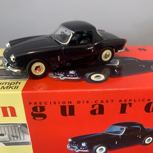 Miniature Triumph Spitfire Bleu Décapotable Vanguards échelle 1/43 - Occasion