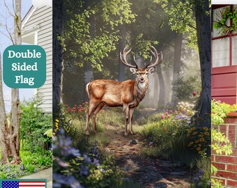 May include: A double-sided garden flag depicting a brown deer with antlers standing on a path in a verdant forest with colourful flowers. The deer is looking directly at the viewer.