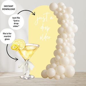 May include: A digital illustration featuring a martini glass with a lemon garnish, a yellow backdrop with the text "just a drop older", and a white balloon arch. The image is labeled as an instant download.