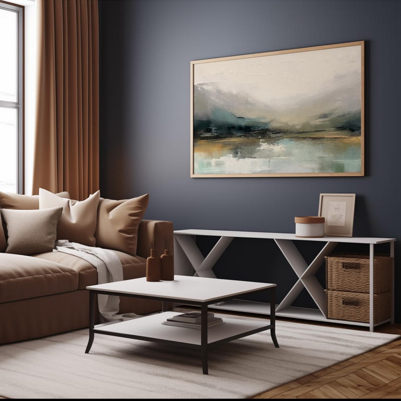 May include: A white, open-shelf console table with a wood-toned top and two woven baskets. The table is in a living room with a brown couch, a coffee table, and a large abstract painting on the wall.