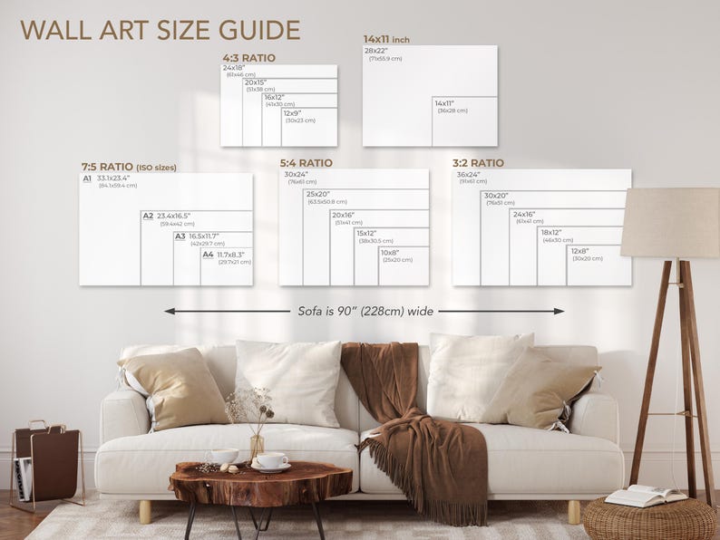 May include: A wall art size guide with different ratios and sizes for artwork. The guide shows the dimensions in inches and centimeters. The guide also shows a sofa that is 90 inches wide.