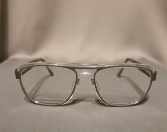 Monture de lunettes Specsavers Penguin Sun 57[]17-140. Belle monture de lunettes grise.