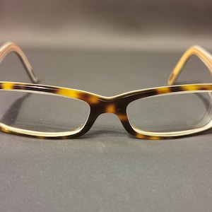 Occhiali. Occhiali da vista Ralph Lauren, modello RA7032. Montatura per occhiali da lettura. L'elegante montatura bicolore Ralph Lauren. #occhiali #RalphLauren