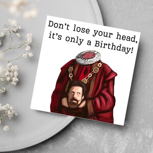 image of a square birthday card with the text 'don't lose your head, it's only a birthday' above an illustrated picture of headless Humphrey from the tv show ghosts in his red period clothing holding his head looking up at his body