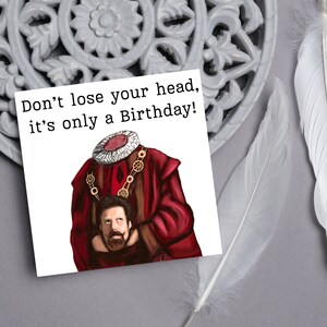 image of a square birthday card with the text 'don't lose your head, it's only a birthday' above an illustrated picture of headless Humphrey from the tv show ghosts in his red period clothing holding his head looking up at his body