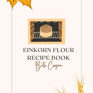 May include: A white rectangle with a brown border, containing the text "EINKORN FLOUR RECIPE BOOK Beth Coogan".  A brown oven with a loaf of bread inside is in the top left corner.  A yellow maple leaf is in the top left corner.  Two yellow wheat stalks are in the bottom right corner.