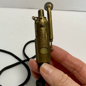 1920s cigarette sale lighter