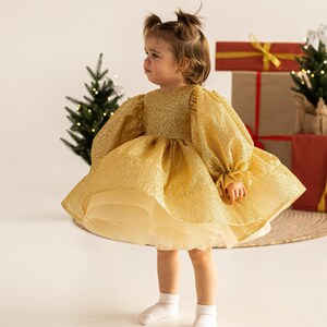 ふわふわの長袖のベビーゴールドスパークルドレス、幼児用クリスマスゴールドグリッタードレス、1歳の誕生日ドレス、女の子のパーティードレス、コンテストドレス