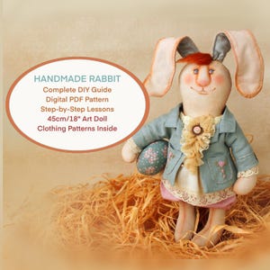 May include: A handmade art doll rabbit, approximately 18 inches tall, wearing a light blue jacket and holding an Easter egg. The doll has a whimsical design with a ruffled collar and pink shorts. The image includes text that reads "HANDMADE RABBIT" and details about the DIY guide.