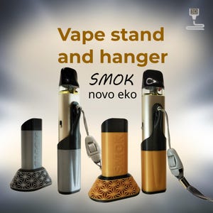 Peut inclure: Pr&eacute;sentation de supports et de supports pour cigarettes &eacute;lectroniques SMOK novo eko. Les supports sont argent&eacute;s et dor&eacute;s, avec des d&eacute;tails noirs et des bases g&eacute;om&eacute;triques. Le texte "Vape stand and hanger" et "SMOK novo eko" est visible.