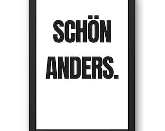 May include: Black and white framed print with the text "SCHÖN ANDERS."