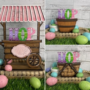 May include: A wooden Easter-themed market stall with a pink striped awning, a sign that says "Market Stand", and the word "HOP" in colourful letters. The stall is decorated with pastel-coloured Easter eggs.