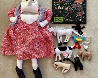 Alma's Designs, Old Lady Who Swallowed a Fly puppet. Complete with all 8 animals + Book