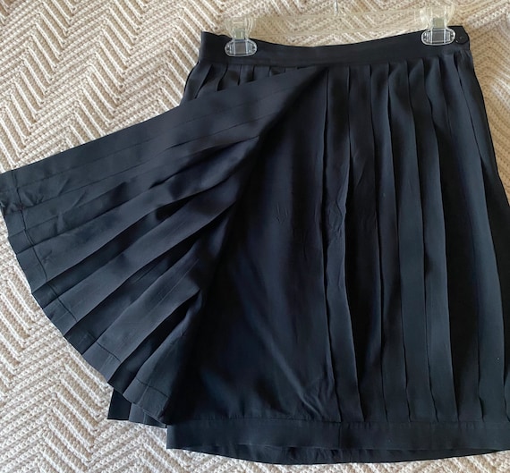 Black pleated top skirt designer