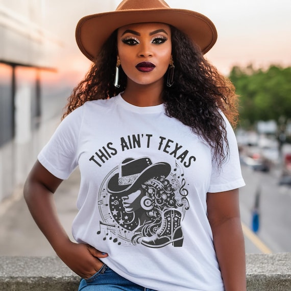 This ain't Texas cute cowgirl tee Western Country girl cowboy hat and boots  women's shirt trail ride tee