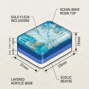 May include: A rectangular object with an ocean-wave resin top containing gold fleck inclusions and a layered acrylic base. The diagram includes text labels: DIMENSION DRAW 1:1, OCEAN-WAVE RESIN TOP, GOLD FLECK INCLUSIONS, ECOLIC BEAYSE, and LAYERED ACRYLIC BASE, with measurements of 15mm, 31mm, 23mm, 1mm, 3mm, and 2mm.