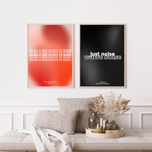 May include: Two framed prints with white text on a red and black background. The print on the left says "When a fire starts to burn" repeated five times. The print on the right says "just noise WHITE NOISE".