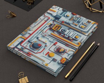 May include: A hardcover journal with a detailed, colorful circuit board design in shades of white, yellow, red, and gray. Gold and black pencils, along with gold binder clips, are arranged around the journal on a gray surface.