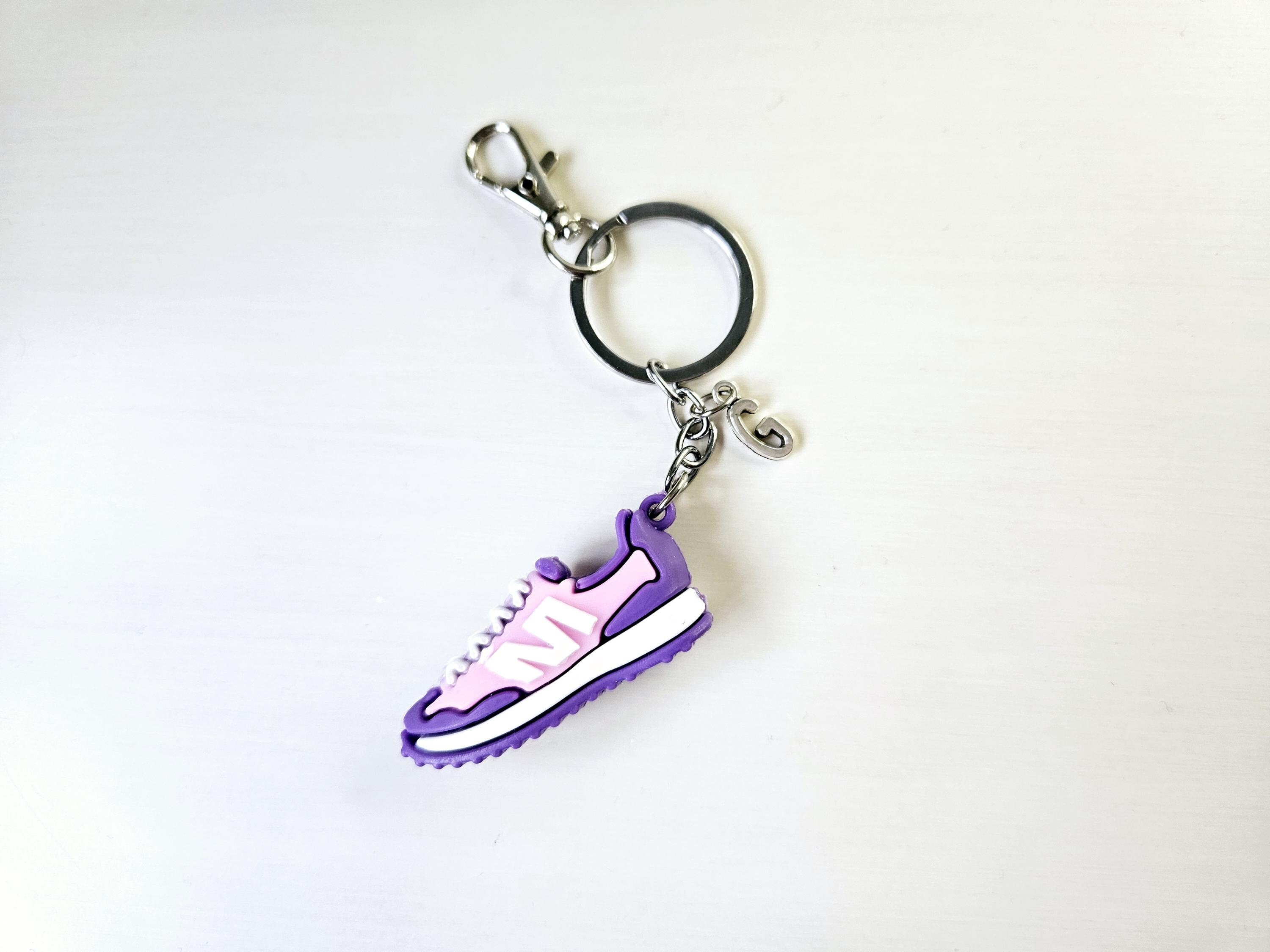 purple nike keychain