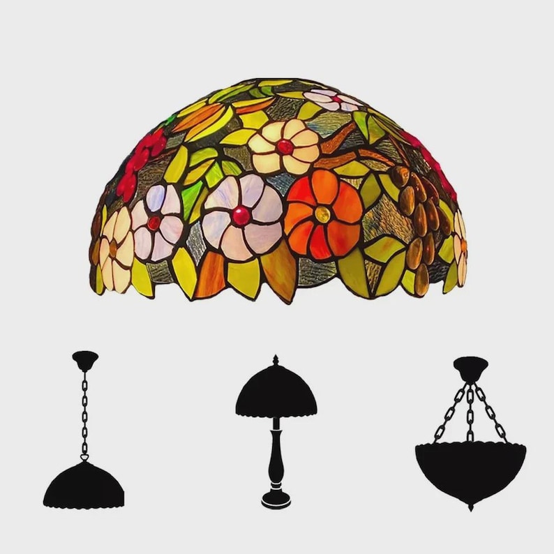 May include: A stained glass lamp shade with a floral design in shades of red, orange, yellow, green, and white. The image also includes silhouettes of a pendant lamp, a table lamp, and a chandelier.