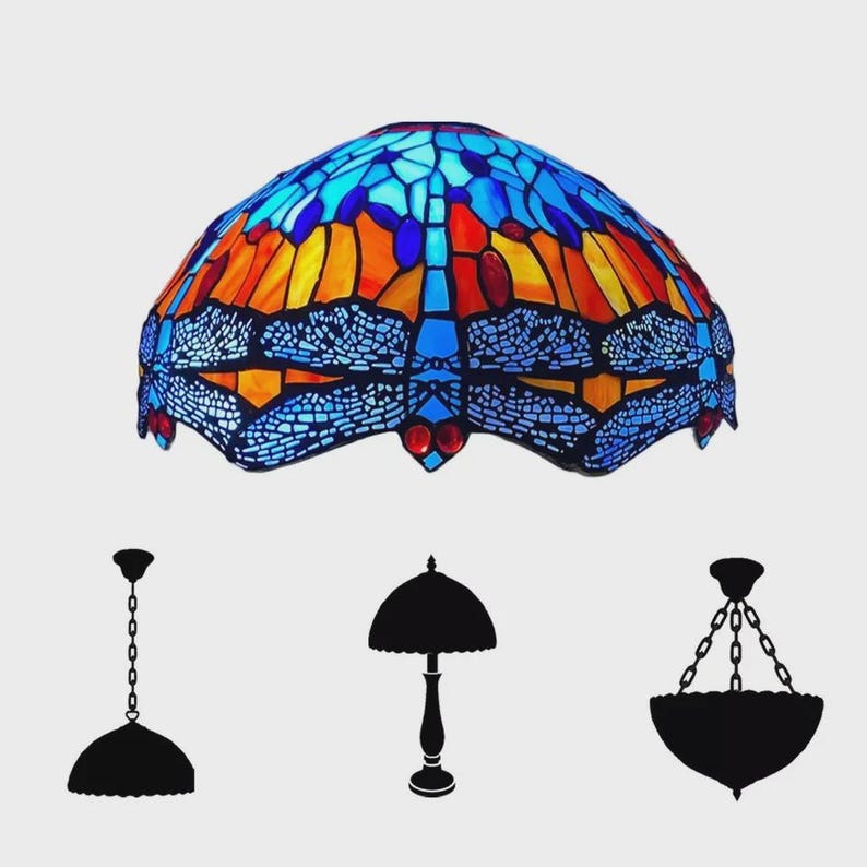 May include: A stained glass lampshade with a dragonfly design in shades of blue, orange, and red. The lampshade is dome-shaped and features intricate details. Silhouettes of different lamp styles are below.