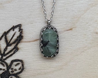 Sterling Silver handmade prehnite necklace. Rectangle shaped gemstone necklace with a fancy bezel. Includes a  20" Chain.