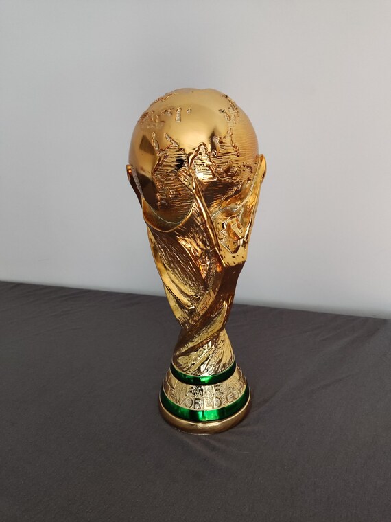 A miniature replica of the World Cup trophy presented by FIFA to