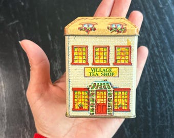 Vintage decorative Tin Lillian Vernon- good condition Village Tea Shop 1984