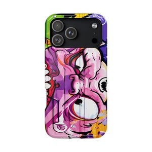 May include: A rectangular smartphone case featuring a vibrant, abstract graffiti-style illustration. The design showcases a prominent pink, distorted face with large, expressive eyes, layered over splashes of green, purple, yellow, and orange paint.
