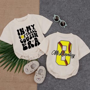 In my Softball Cousin Era Bubble Romper, Game Day Baby Clothes, Gameday Outfit, Baby Clothes, Short Sleeve Romper, Newborn Clothes